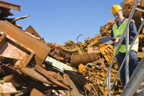 Properly loaded enclosed skip ready for collection in Paddington